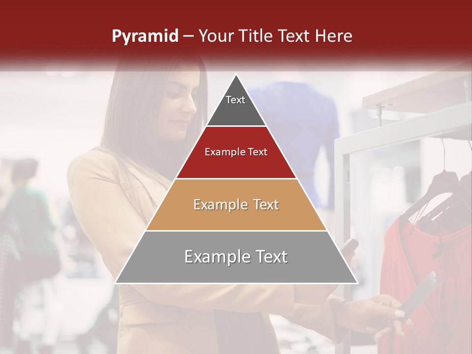 A Woman Looking At A Cell Phone In A Clothing Store PowerPoint Template