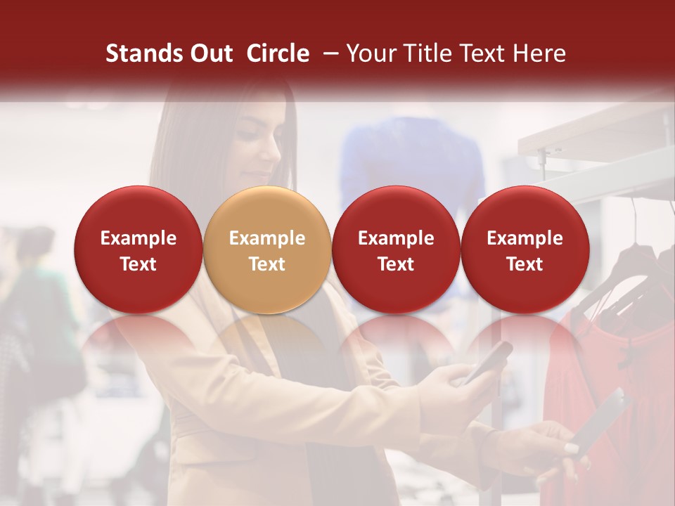 A Woman Looking At A Cell Phone In A Clothing Store PowerPoint Template