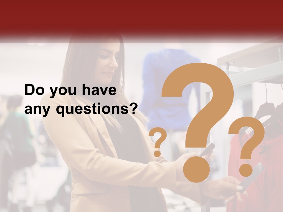 A Woman Looking At A Cell Phone In A Clothing Store PowerPoint Template