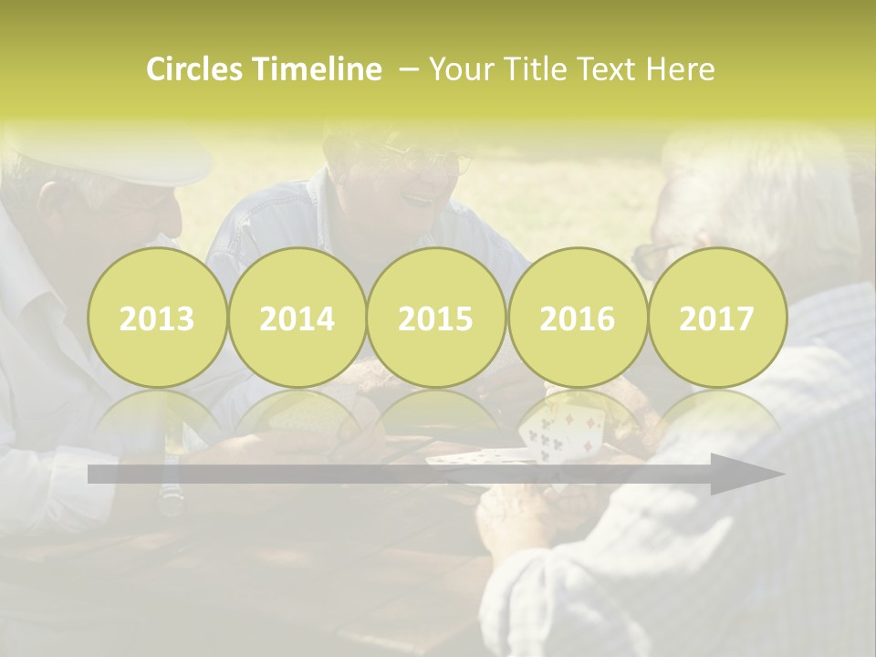 A Group Of Elderly Men Playing Cards At A Picnic Table PowerPoint Template