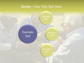A Group Of Elderly Men Playing Cards At A Picnic Table PowerPoint Template