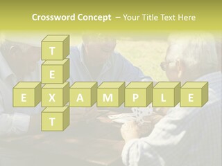 A Group Of Elderly Men Playing Cards At A Picnic Table PowerPoint Template
