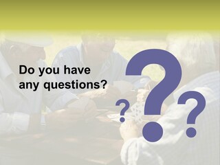 A Group Of Elderly Men Playing Cards At A Picnic Table PowerPoint Template