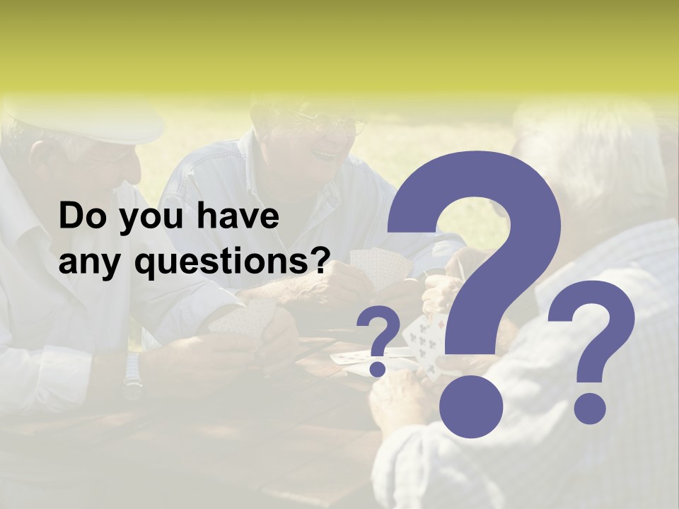 A Group Of Elderly Men Playing Cards At A Picnic Table PowerPoint Template