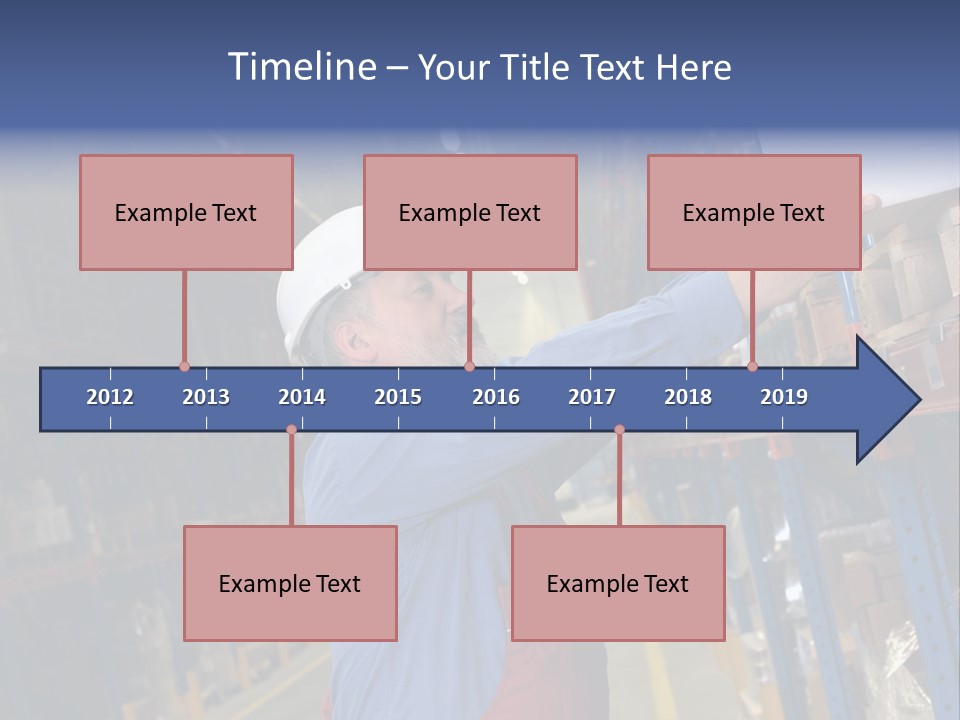 A Man In A Warehouse Is Looking At A Piece Of Paper PowerPoint Template