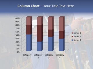 A Man In A Warehouse Is Looking At A Piece Of Paper PowerPoint Template