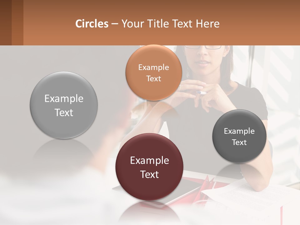 A Woman Sitting At A Table Talking To A Man PowerPoint Template