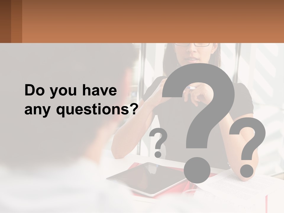 A Woman Sitting At A Table Talking To A Man PowerPoint Template