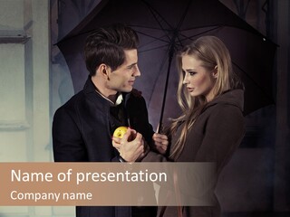 A Man And A Woman Holding An Apple PowerPoint Template