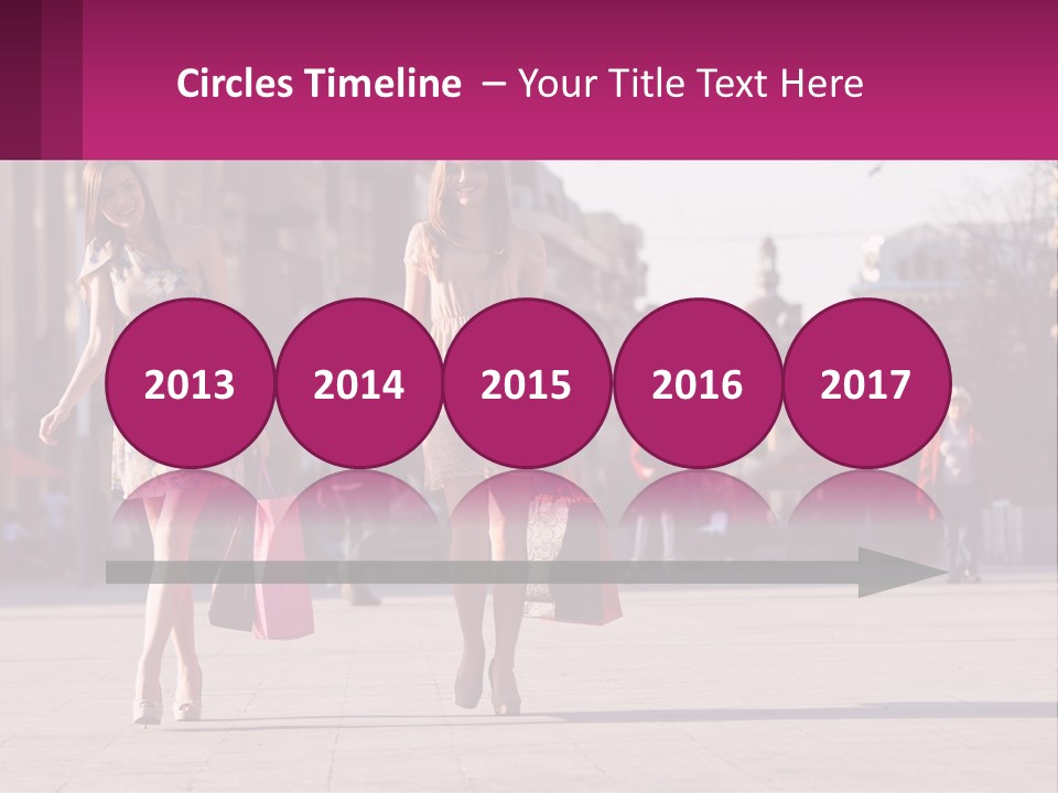 Two Women Walking Down A Street Holding Shopping Bags PowerPoint Template