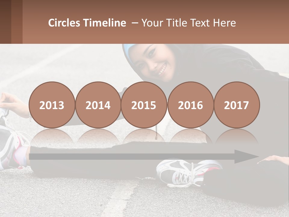 A Woman In A Hijab Is Sitting On The Ground PowerPoint Template