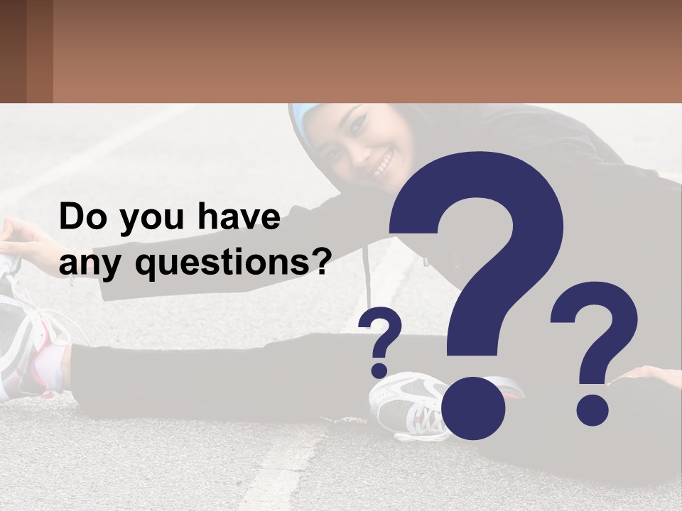 A Woman In A Hijab Is Sitting On The Ground PowerPoint Template
