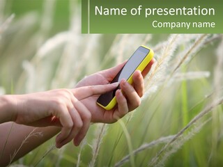 A Person Holding A Cell Phone In Their Hand PowerPoint Template