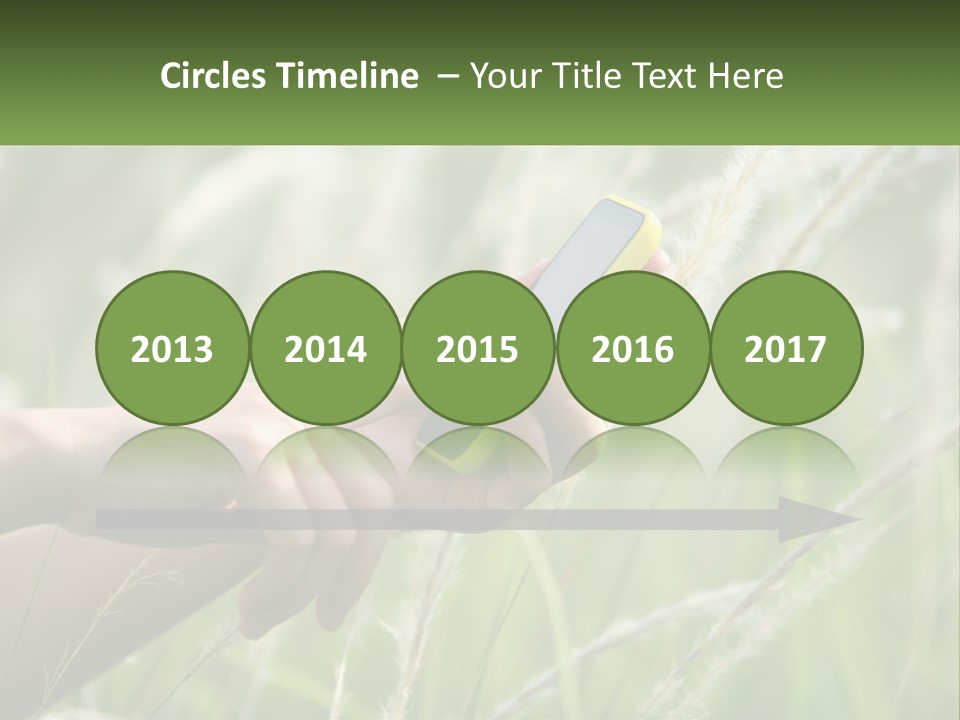 A Person Holding A Cell Phone In Their Hand PowerPoint Template