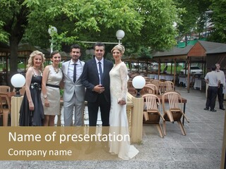 A Group Of People Standing Next To Each Other PowerPoint Template