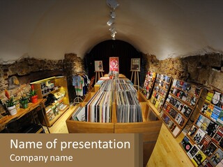 A Room Filled With Lots Of Records And Magazines PowerPoint Template