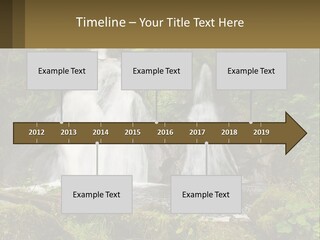 A Waterfall In The Middle Of A Lush Green Forest PowerPoint Template