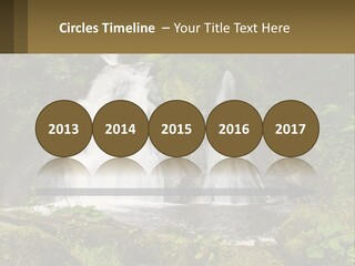 A Waterfall In The Middle Of A Lush Green Forest PowerPoint Template