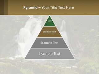 A Waterfall In The Middle Of A Lush Green Forest PowerPoint Template