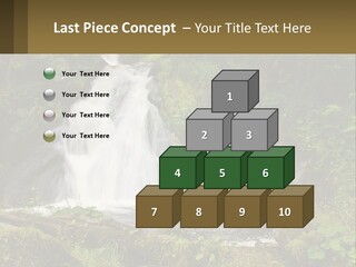 A Waterfall In The Middle Of A Lush Green Forest PowerPoint Template