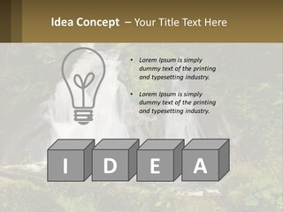 A Waterfall In The Middle Of A Lush Green Forest PowerPoint Template