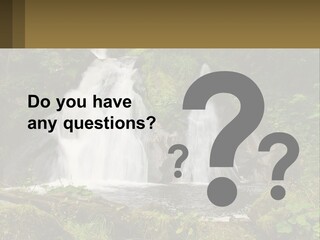 A Waterfall In The Middle Of A Lush Green Forest PowerPoint Template