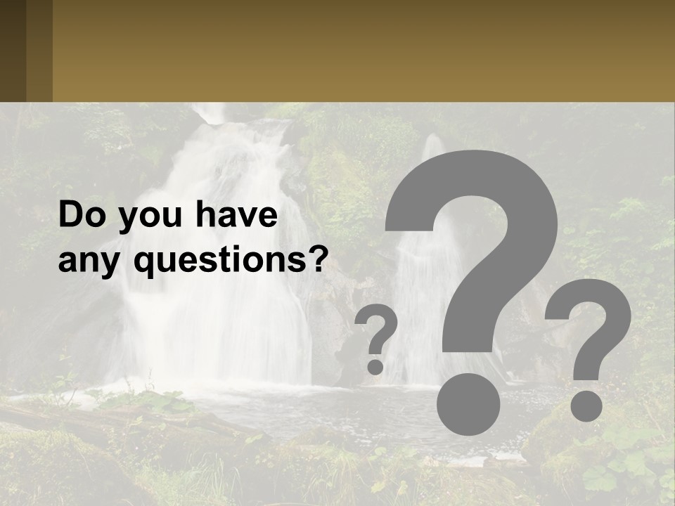 A Waterfall In The Middle Of A Lush Green Forest PowerPoint Template