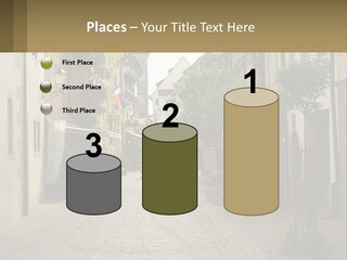 A Group Of People Walking Down A Street Next To Tall Buildings PowerPoint Template