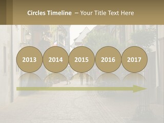 A Group Of People Walking Down A Street Next To Tall Buildings PowerPoint Template