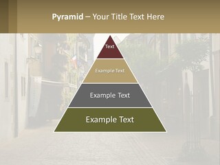 A Group Of People Walking Down A Street Next To Tall Buildings PowerPoint Template