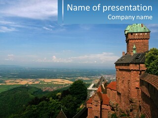 A Castle On Top Of A Hill With A Blue Sky In The Background PowerPoint Template