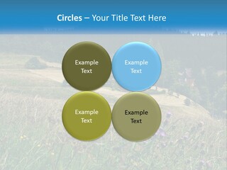 A House In The Middle Of A Field With Trees In The Background PowerPoint Template