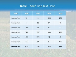 A House In The Middle Of A Field With Trees In The Background PowerPoint Template