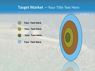 A House In The Middle Of A Field With Trees In The Background PowerPoint Template