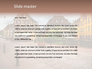 A City Street With Old Buildings And Cobblestones PowerPoint Template