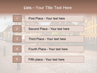 A City Street With Old Buildings And Cobblestones PowerPoint Template