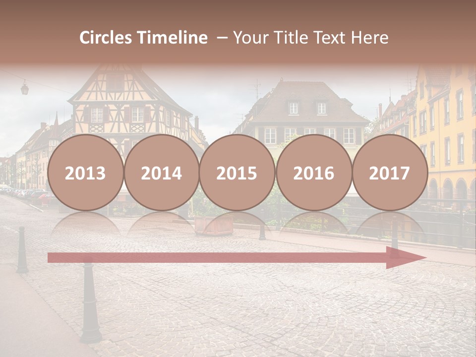 A City Street With Old Buildings And Cobblestones PowerPoint Template