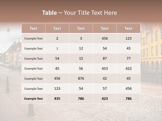 A City Street With Old Buildings And Cobblestones PowerPoint Template