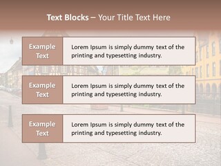 A City Street With Old Buildings And Cobblestones PowerPoint Template