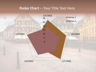 A City Street With Old Buildings And Cobblestones PowerPoint Template