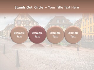 A City Street With Old Buildings And Cobblestones PowerPoint Template