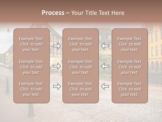 A City Street With Old Buildings And Cobblestones PowerPoint Template