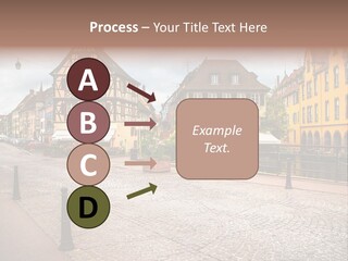A City Street With Old Buildings And Cobblestones PowerPoint Template