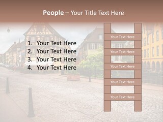 A City Street With Old Buildings And Cobblestones PowerPoint Template