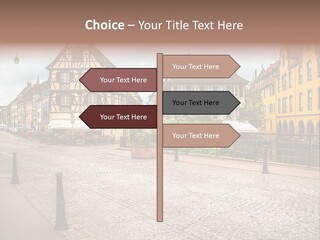 A City Street With Old Buildings And Cobblestones PowerPoint Template