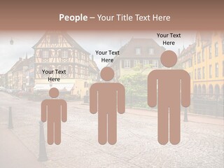 A City Street With Old Buildings And Cobblestones PowerPoint Template