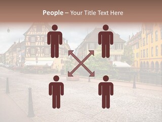 A City Street With Old Buildings And Cobblestones PowerPoint Template