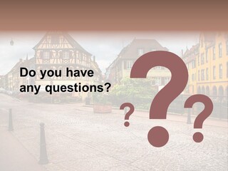 A City Street With Old Buildings And Cobblestones PowerPoint Template