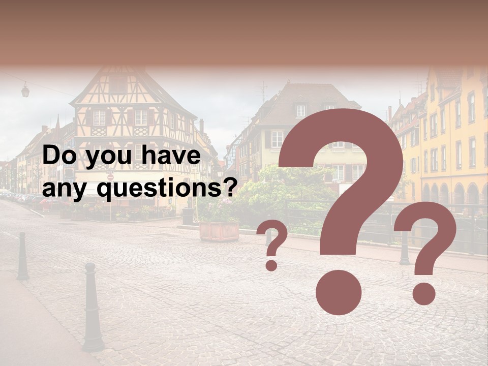 A City Street With Old Buildings And Cobblestones PowerPoint Template