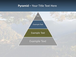 A Scenic View Of A Valley With Trees And Mountains In The Background PowerPoint Template